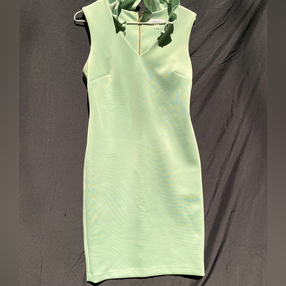 Beautiful mint green midi size six gently worn